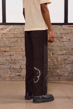 Load image into Gallery viewer, UNFINISHED GRAFITTI WIDE PANTS- STONED BLACK
