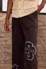 Load image into Gallery viewer, UNFINISHED GRAFITTI WIDE PANTS- STONED BLACK
